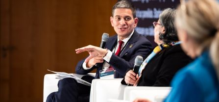 David Miliband (President and CEO, International Rescue Committee, IRC) Man speaking into the mic at the panel of BCSC2024