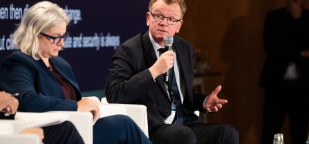 From left to right, Erin Sikorsky (Director, The Center for Climate and Security) and Dr. Ole Diehl (Vice President of the German Federal Intelligence Service, BND) First Panel, male speaker speaking into mic