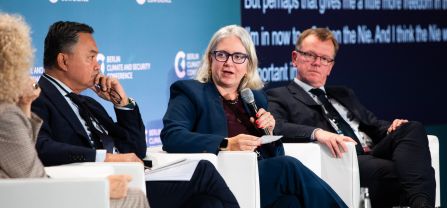 From left to right, H.E. Dr. Dino Patti Djalal (Founder, Foreign Policy Community of Indonesia), Erin Sikorsky (Director, The Center for Climate and Security) and Dr. Ole Diehl (Vice President of the German Federal Intelligence Service, BND) First Panel, female speaker speaking into pmic