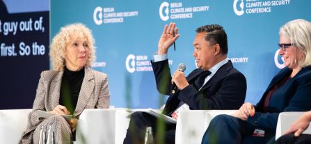 From left to right, H.E. Jennifer Morgan (State Secretary and Special Envoy for International Climate Action, German Federal Foreign Office), H.E. Dr. Dino Patti Djalal (Founder, Foreign Policy Community of Indonesia) and Erin Sikorsky (Director, The Center for Climate and Security) Male speaker, guesturing while speaking into mic, sitting