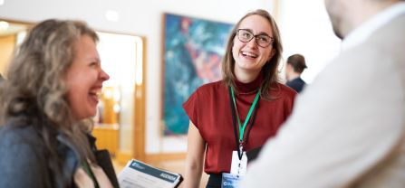 From left to right, Alexandra Steinkraus and Dorian Wevers (adelphi) Participants of BCSC2024 chatting in the coffee break